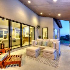 Covered Porch With Large Sliding Glass Doors & Comfy Seating