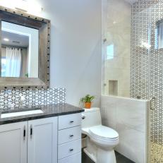 Contemporary Bathroom With Geometric Tile, Walk-In Shower and Natural Wood Mirror