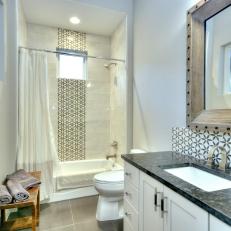 Transitional Bathroom Features Geometric Tile Design on Backsplash & Shower 