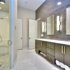 Sleek, Contemporary Bathroom With Gray Stone Accent Wall & Double Vanity