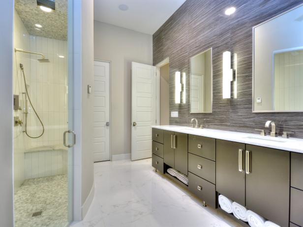 Sleek, Contemporary Bathroom With Gray Stone Accent Wall & Double ...