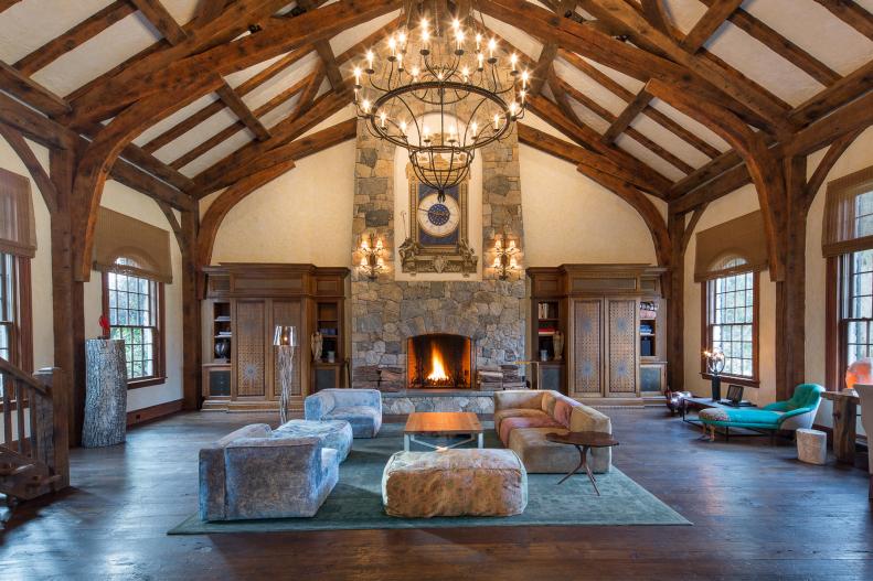 Country Great Room With Exposed Wood Beams & Stone Fireplace