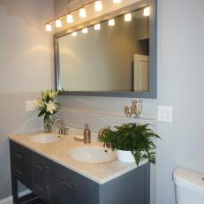 Large Vanity with Mirror and Pendant Light in Remodeled Upstairs Bathroom