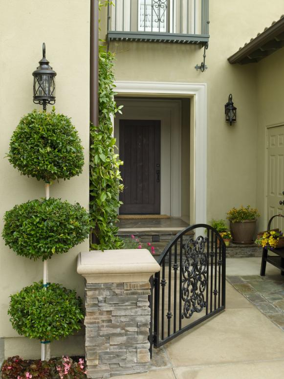 Mediterranean-Style Home With Wrought-Iron Gate