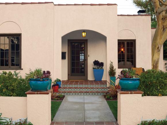 Small Mediterranean Home With Neutral Exterior