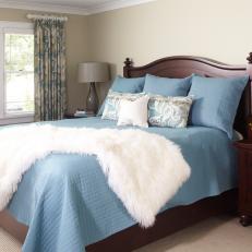 Peaceful Neutral Bedroom With Blue Bedding