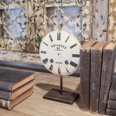 Fixer Upper: Antique Clock and Aged Books Decorate Home