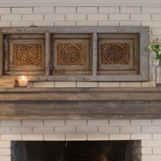 Fixer Upper: Rustic Wood Mantel in Remodeled Living Room 