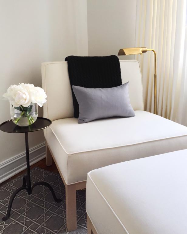 Bedroom Sitting Area Features Plush Chair & Ottoman | HGTV