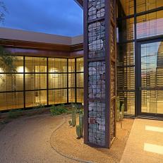 Contemporary Southwestern Exterior with Glass Walls
