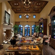 Mediterranean Living Room Boasts Grand Fireplace 