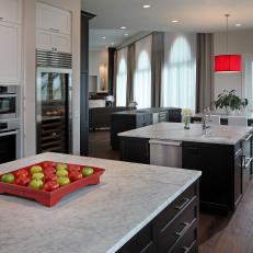 Transitional Eat-In Kitchen Features Twin Islands & White Marble Countertops
