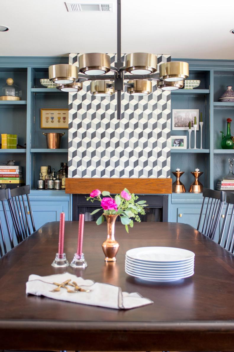 Blue Dining Room with Industrial Chandelier and Graphic Art