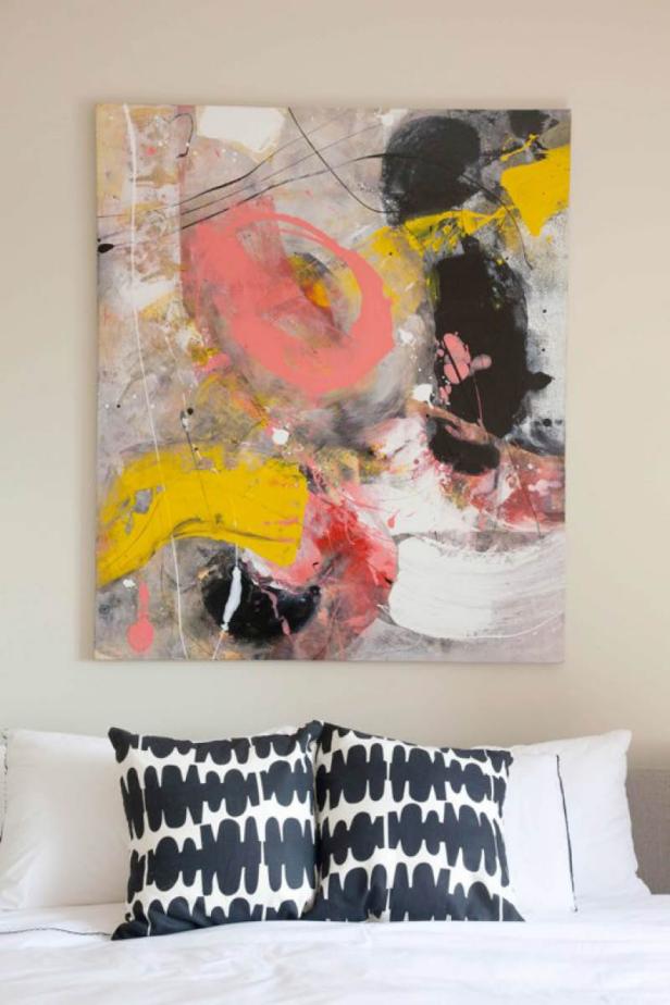 Abstract Painting Above Bed With Black & White Throw Pillows