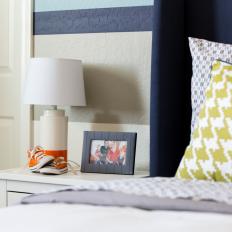 Detail of Contemporary Bedroom With Yellow Houndstooth Pillow