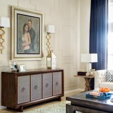 Brown Wood Console Table and Portrait