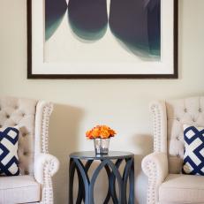 Black End Table and Artwork
