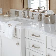 Crisp White Vanity in Beige Beach House Bathroom