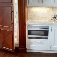 Walnut Paneled Refrigerator in Luxurious Chef's Kitchen
