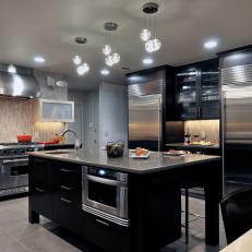 Contemporary Kitchen With Dark Cabinets Is Sleek, Edgy