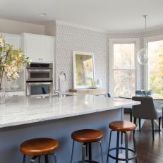 Pretty Eat-In Kitchen With Industrial Barstools