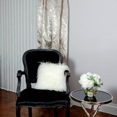 Black Chair and Round End Table