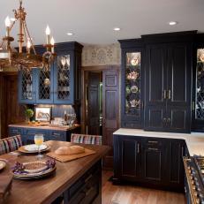 Distressed Black Cabinets Add Drama to Traditional Kitchen