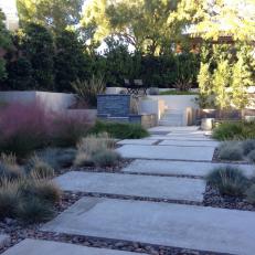 Contemporary Concrete Walkway Through Beautiful Garden