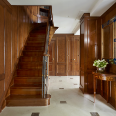 Traditional Entryway With Hardwood Stairwell