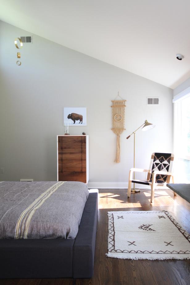 White Corner of Bedroom With Buffalo Art, Black & White Rug