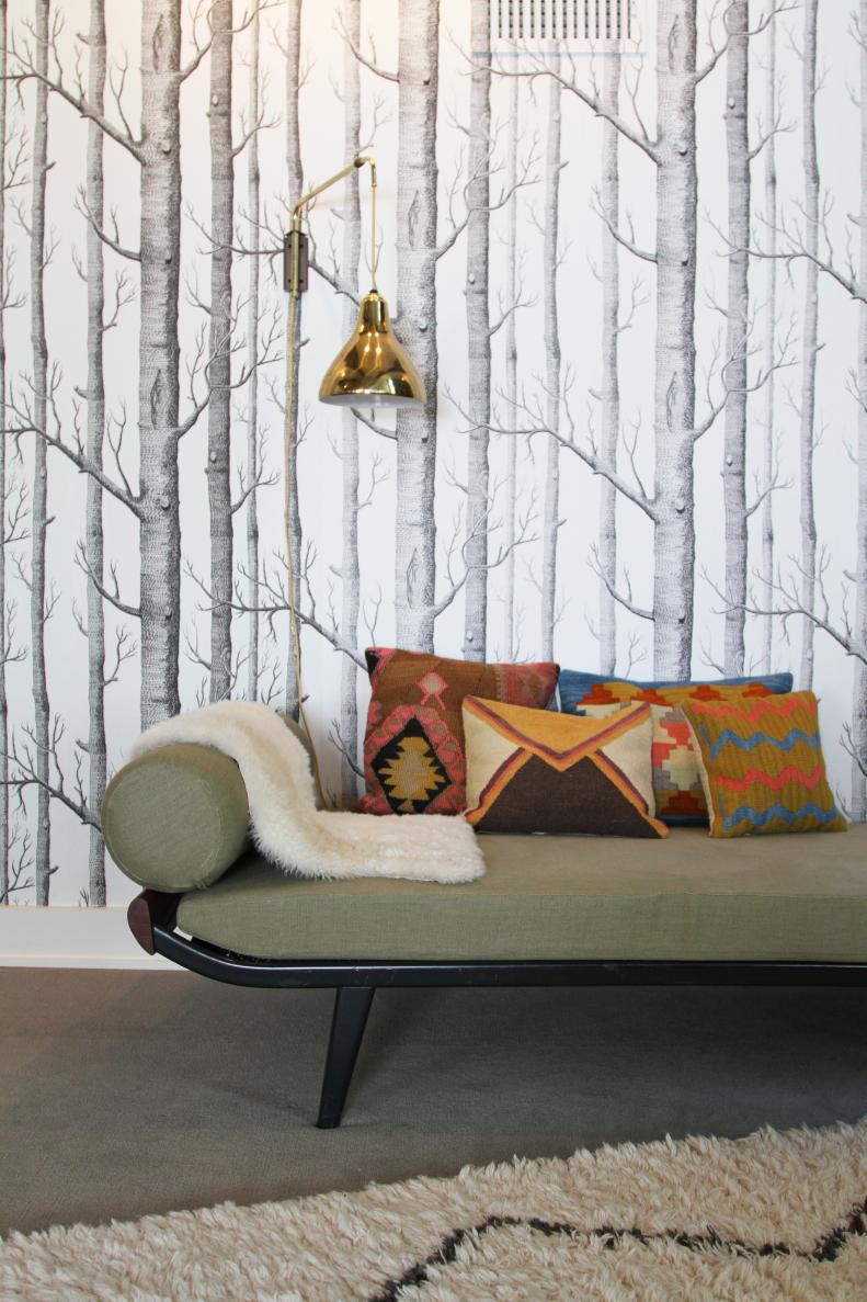 Tree Wallpaper Behind Green Chaise With Southwestern Pillows