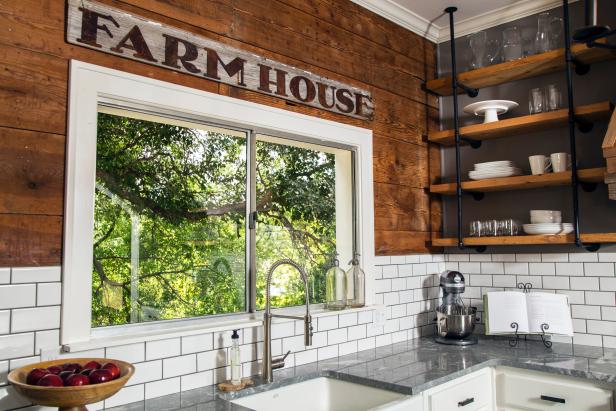 Shiplap Wall with a Farmhouse Sign and White Subway Tile Underneath 