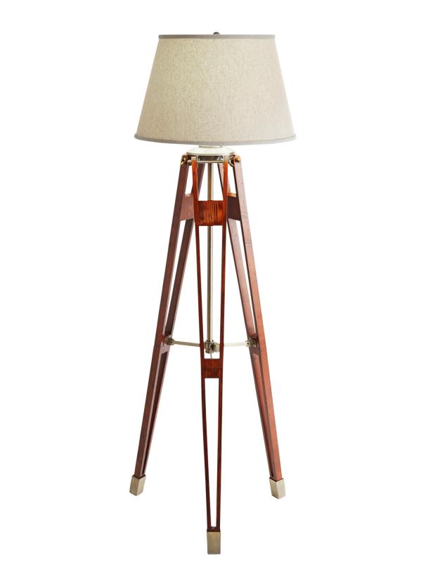 A wood and metal tripod floor lamp makes a statement.
