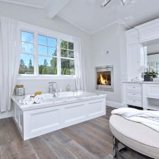Elegant Master Bath With Fireplace