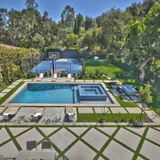 Backyard with pool and basketball court