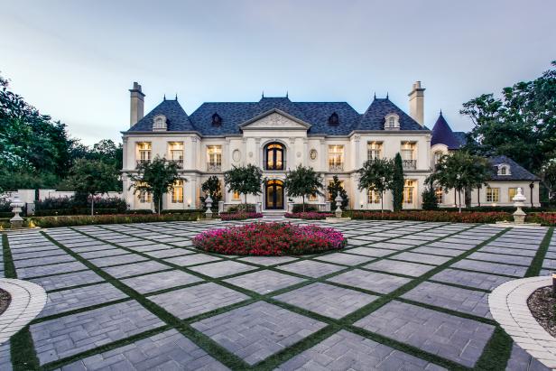 Landscaped gardens surround the chateau.
