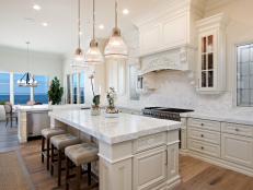 White, Traditional Kitchen With Marble Countertops and Backsplash