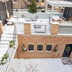 Snowy Rooftop Patio on Historic Chicago Home 