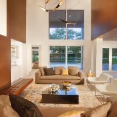 Chic, Open Living Room Features Strong Geometric Shapes & Assorted Seating