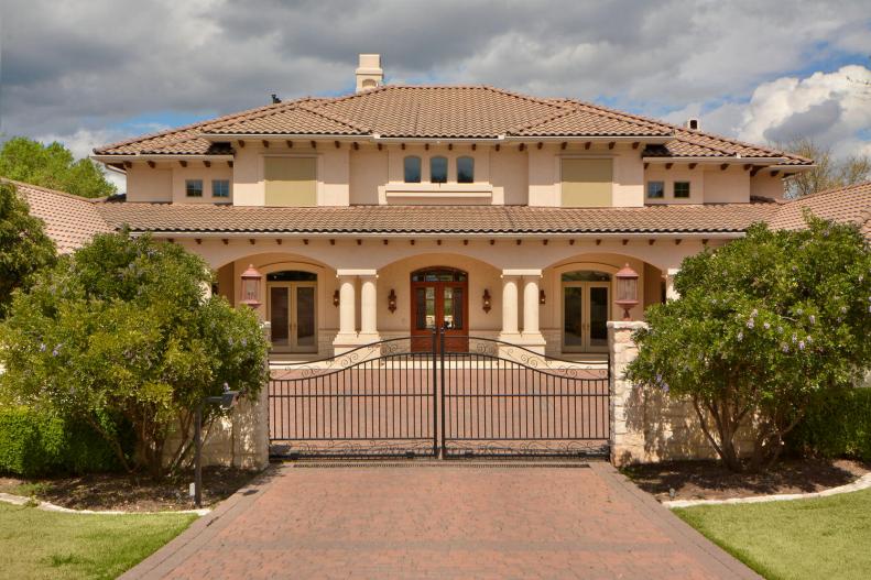 Neutral Mediterranean Home Exterior and Wrought Iron Gate