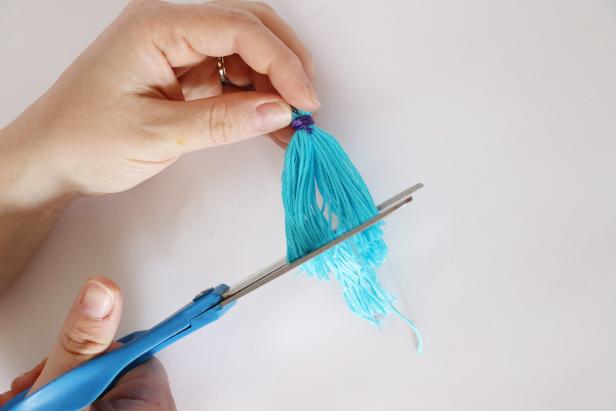 Trim the bottom of the tassel to make it even. Make all of the tassels for your necklace.