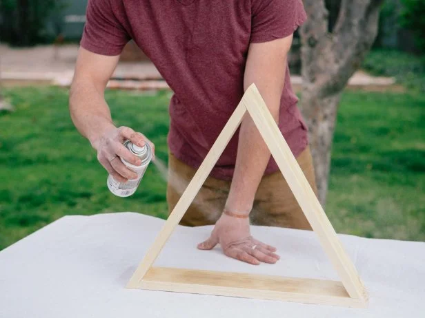 Give a wood triangle shelf some character with spray paint, stain or poly.