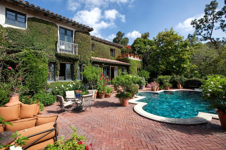 Charming Patio Boasts Outdoor Dining and Swimming Pool 