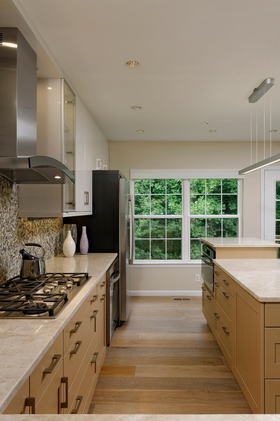 Midcentury Modern Galley Kitchen Features Neutral Cabinetry | HGTV