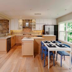 Contemporary Eat-In Kitchen With Bold Blue Dining Chairs