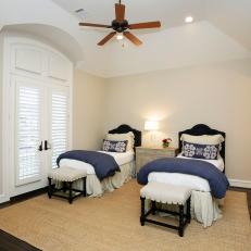 Traditional Guest Room With Twin Beds and Blue Accents