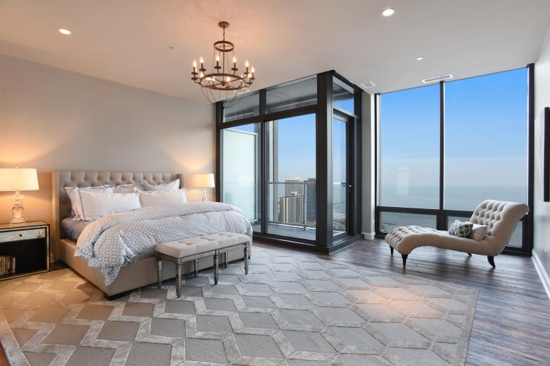 Neutral Contemporary Master Bedroom With Large Windows & City View