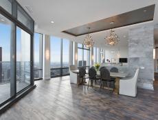 Contemporary Dining Room With Large Windows, City View & Hardwood