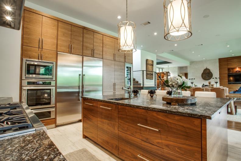 Contemporary Kitchen With Walnut Cabinets and Stainless Appliances