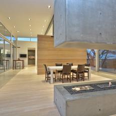 Open Plan Living Space With Contemporary Concrete Fireplace 
